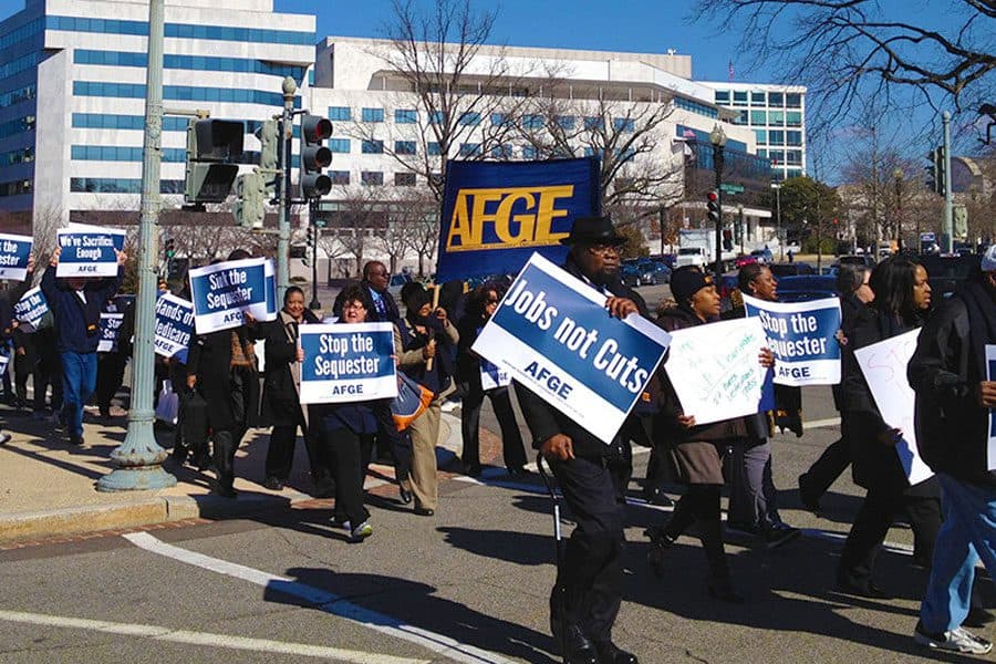 AFGE members marching for federal employee rights